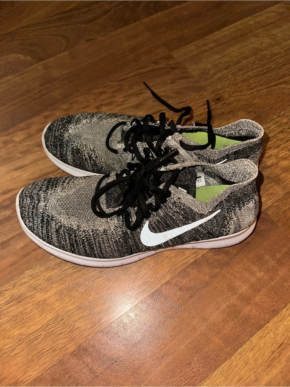 Nike Women’s Gray and Black Knit Trainer Sneakers with White Swoosh